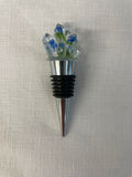 Unique resin wine bottle stopper with recycled wine bottle chips embedded inside.  Since our profit goes to animal rescue.