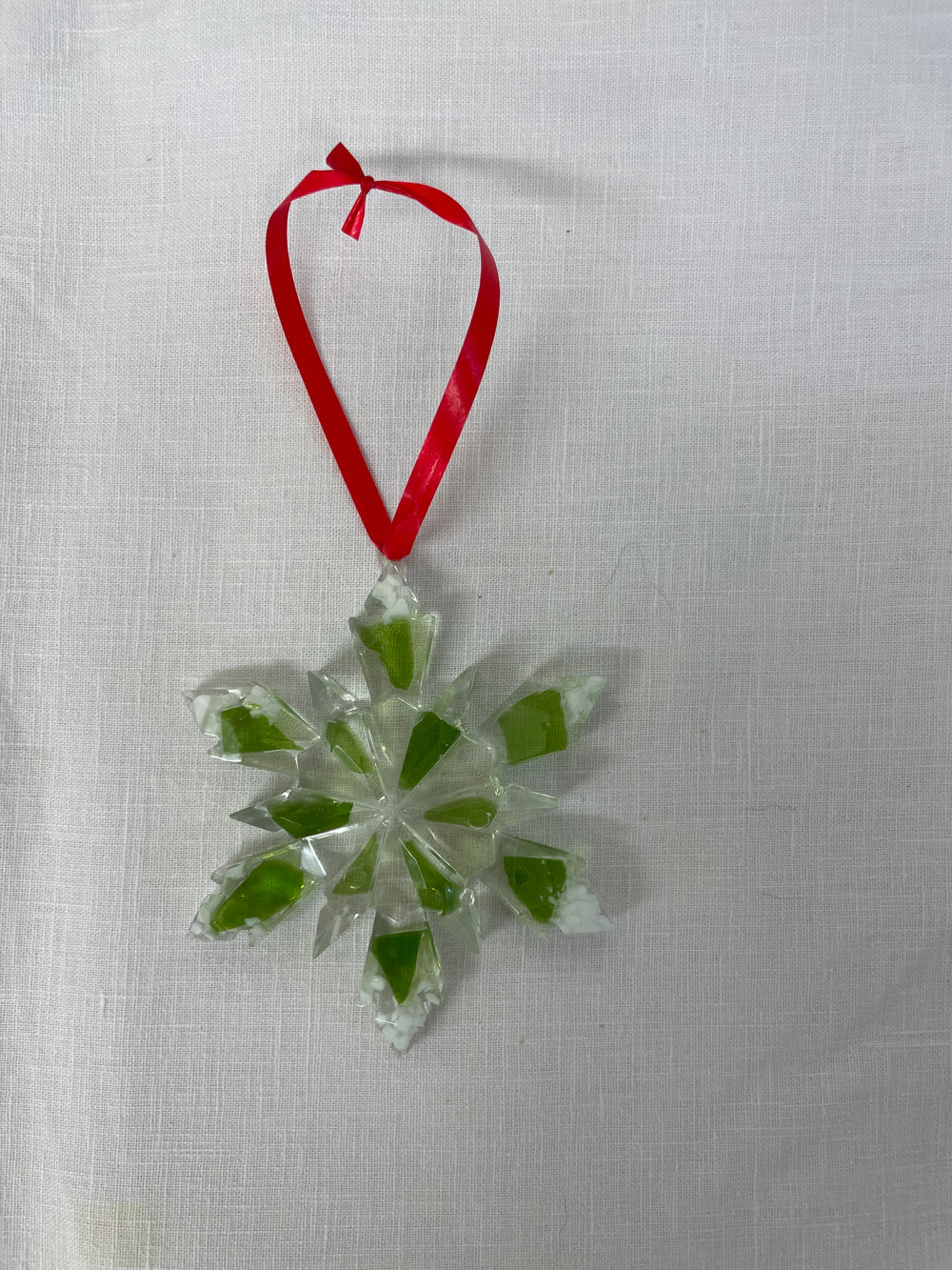 Resin Christmas Ornament with recycled wine bottle glass embedded.