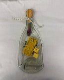 Clear slumped wine bottle platter with image of grapes