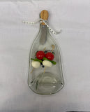 Clear slumped wine bottle platter with image of grapes