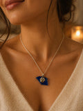 Glass necklace with paw charm