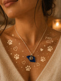 Glass necklace with paw charm