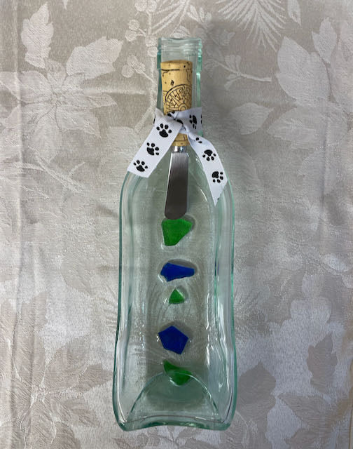 Unique slumped wine bottle tray with recycled wine bottle chips embedded.  Profit goes to animal rescue!
