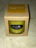Wine bottle soy wax candle.  Profit goes to animal rescue.